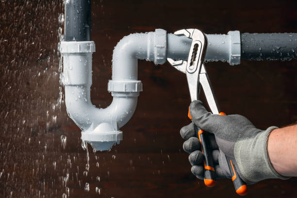 Professional Drain Cleaning technician working in Alma, AR